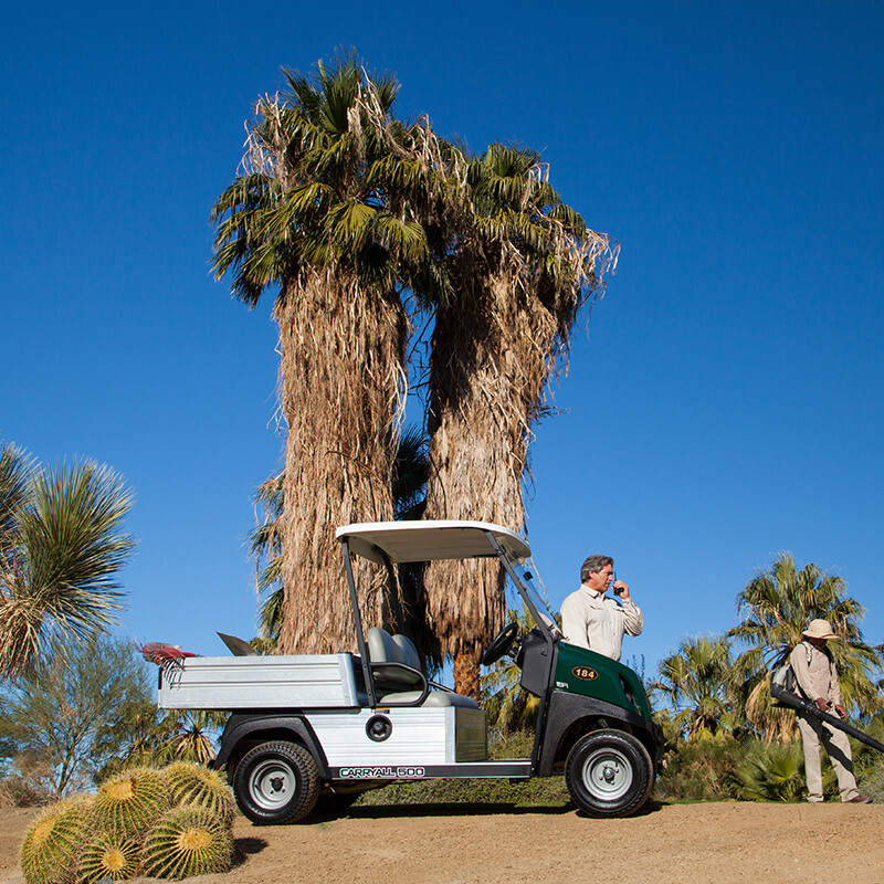 Carryall golf car in a tropical setting in Nassau, Bahamas, presented by Shirley Enterprises Limited
